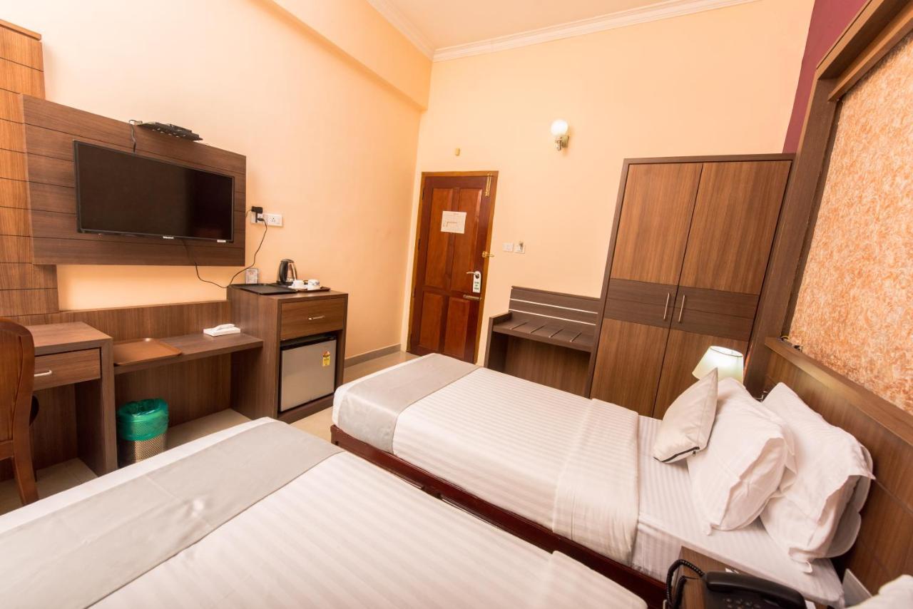 Kallada Golden Hotel Thrissur Buitenkant foto